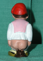 A traditional Catalan caganer from the back.