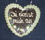 A Lebkuchenherz (note: The icing words "Du ekelst mich an" mean "You disgust me", probably a joke, since Lebkuchen usually come with a nice message such as "I love you")